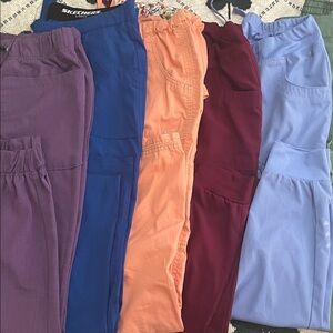 Women's scrub Pack - Purple, Blue, Peach, Burgundy, Light Blue and sage green.